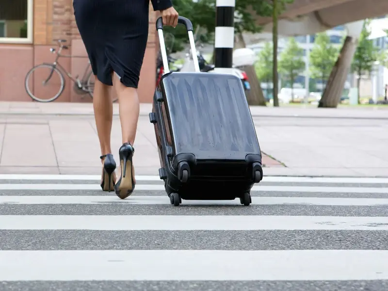 Legal team investigating fatal pedestrian accident near Phoenix Raceway in Avondale with insurance documents and crash report