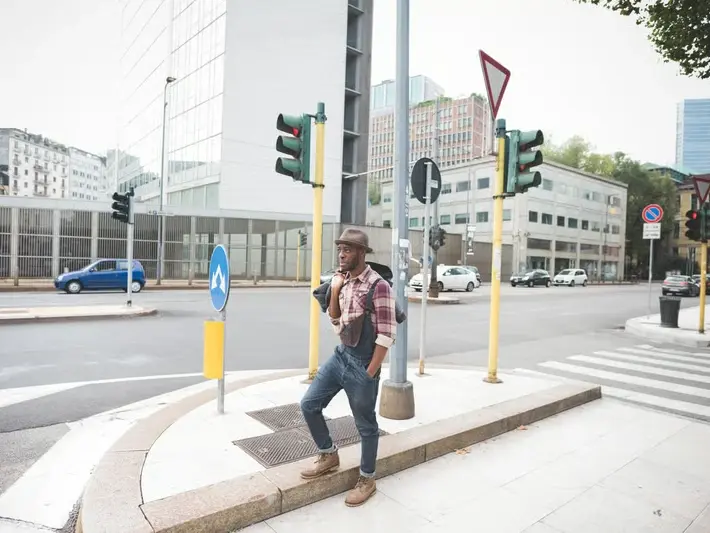 Pedestrian death lawsuit scene analysis near a master-planned community entrance in Buckeye with desert sunset lighting